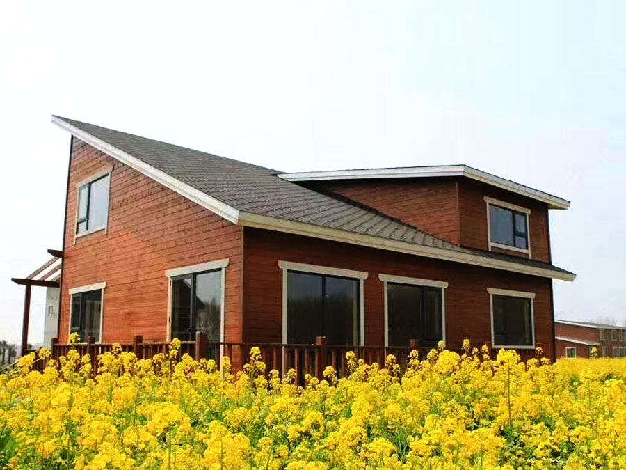 Charming Small Wooden House Nestled in Golden Wildflowers Debuts as Rural Retreat