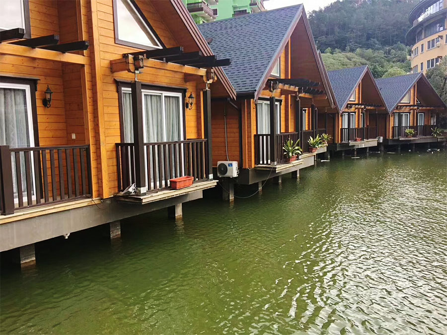 Floating Small Wooden Houses Make Splash as Dual-Purpose Destination