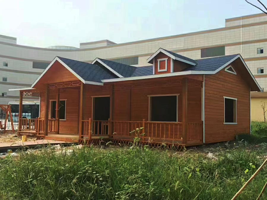 Vibrant Red Small Wooden House Brings Rustic Romance to Countryside Getaways