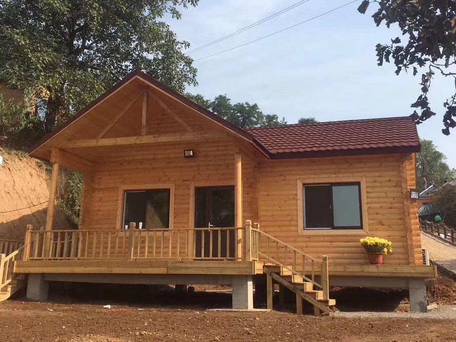 Tree-Integrated Small Wooden House Offers Enchanting Nature Retreat